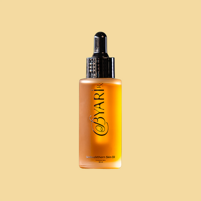 ByAri RX Seabuckthorn Oil bottle on a beige background