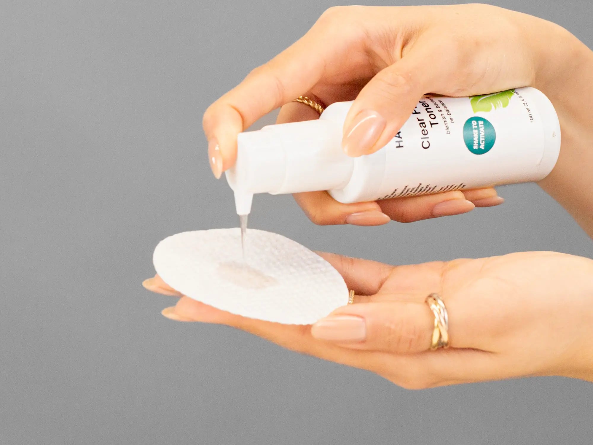 Laziza from LAZ Skincare demonstrating the texture and application of Hale & Hush Clear Future Toner on her hand