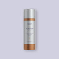 Alastin C-Radical Defense Antioxidant Serum bottle on a light purple background