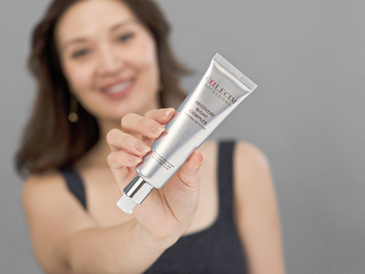 Laziza from LAZ Skincare demonstrating the texture and application of Calecim Recovery Night Complex on her hand