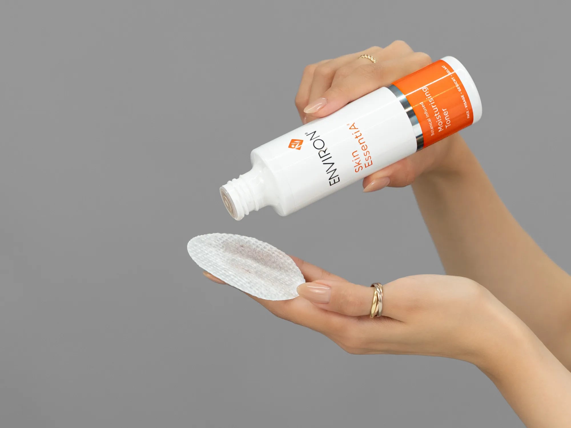Laziza from LAZ Skincare demonstrating the texture and application of Environ Moisturising Toner on her hand