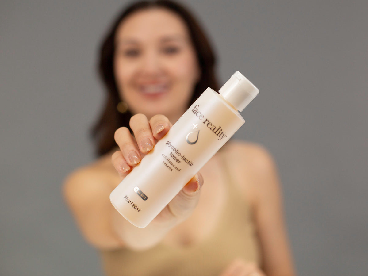 Laziza from LAZ Skincare demonstrating the texture and application of Face Reality Glycolic-Lactic Toner on her hand