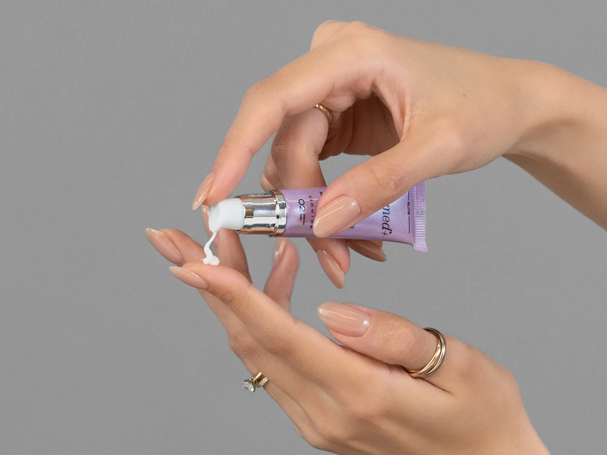 Laziza from LAZ Skincare demonstrating the texture and application of GlyMed Lip Enhancer on her hand