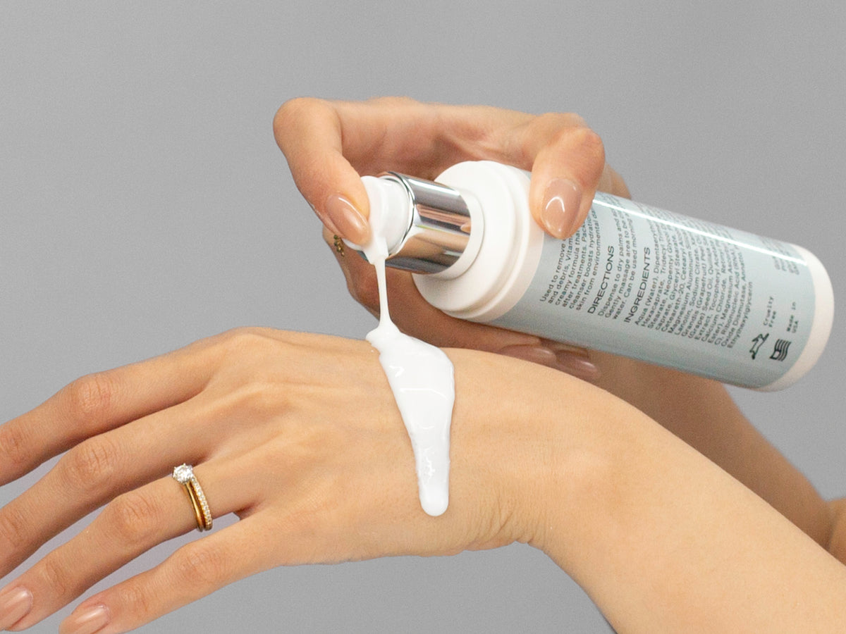 Laziza from LAZ Skincare demonstrating the texture and application of GlyMed Vitamin C Cleanser on her hand