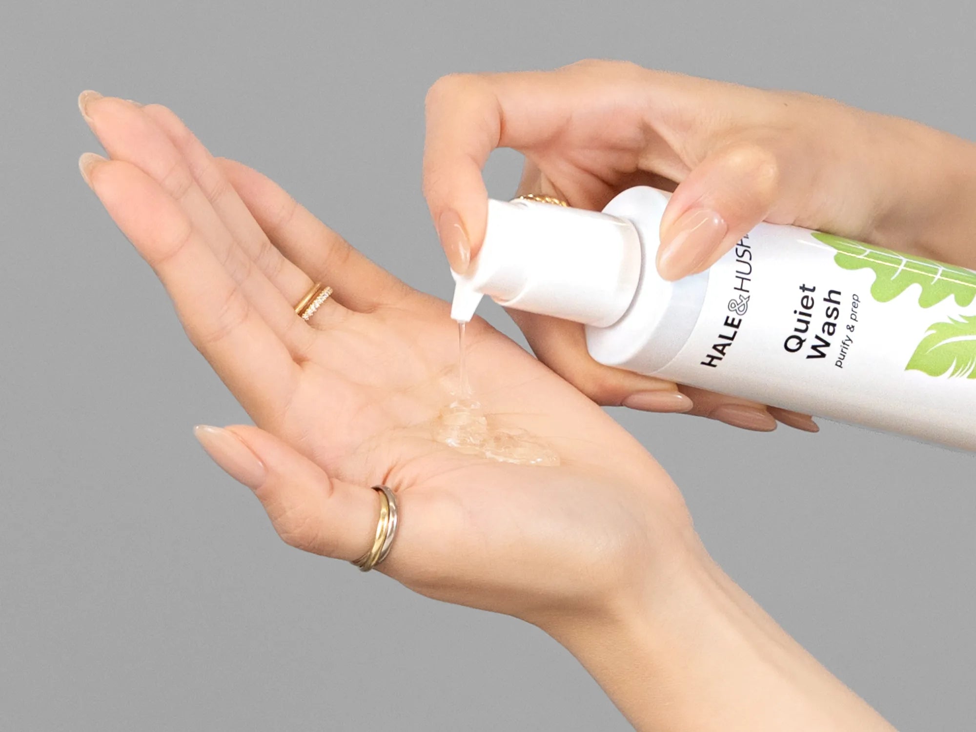 Laziza from LAZ Skincare demonstrating the texture and application of Hale & Hush Quiet Wash on her hand