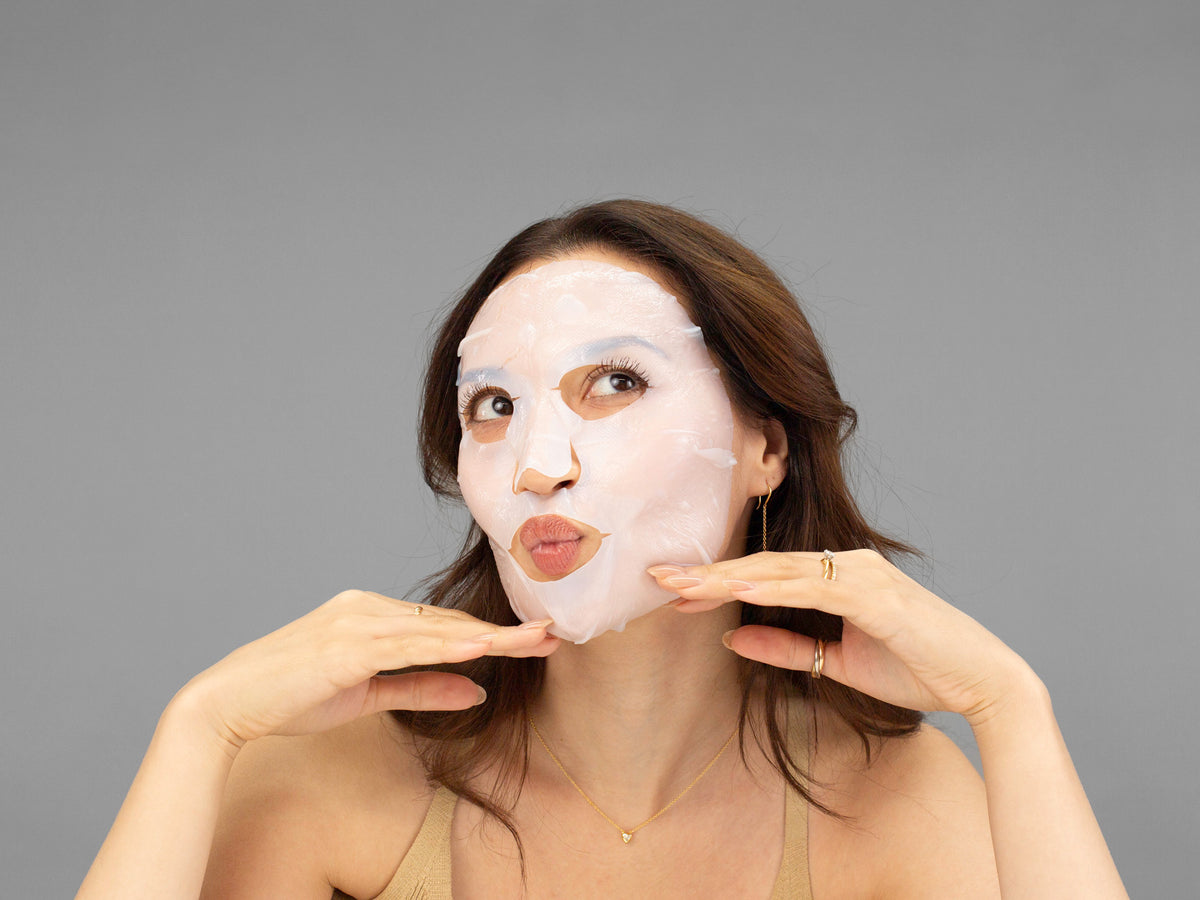 Laziza from LAZ Skincare demonstrating the texture and application of Hydrinity Restorative HA+ Mask on her hand