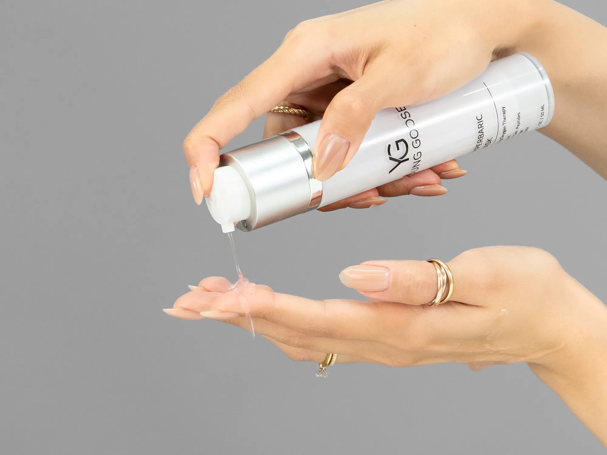 Laziza from LAZ Skincare demonstrating the texture and application of Young Goose Hyperbaric Mask on her hand